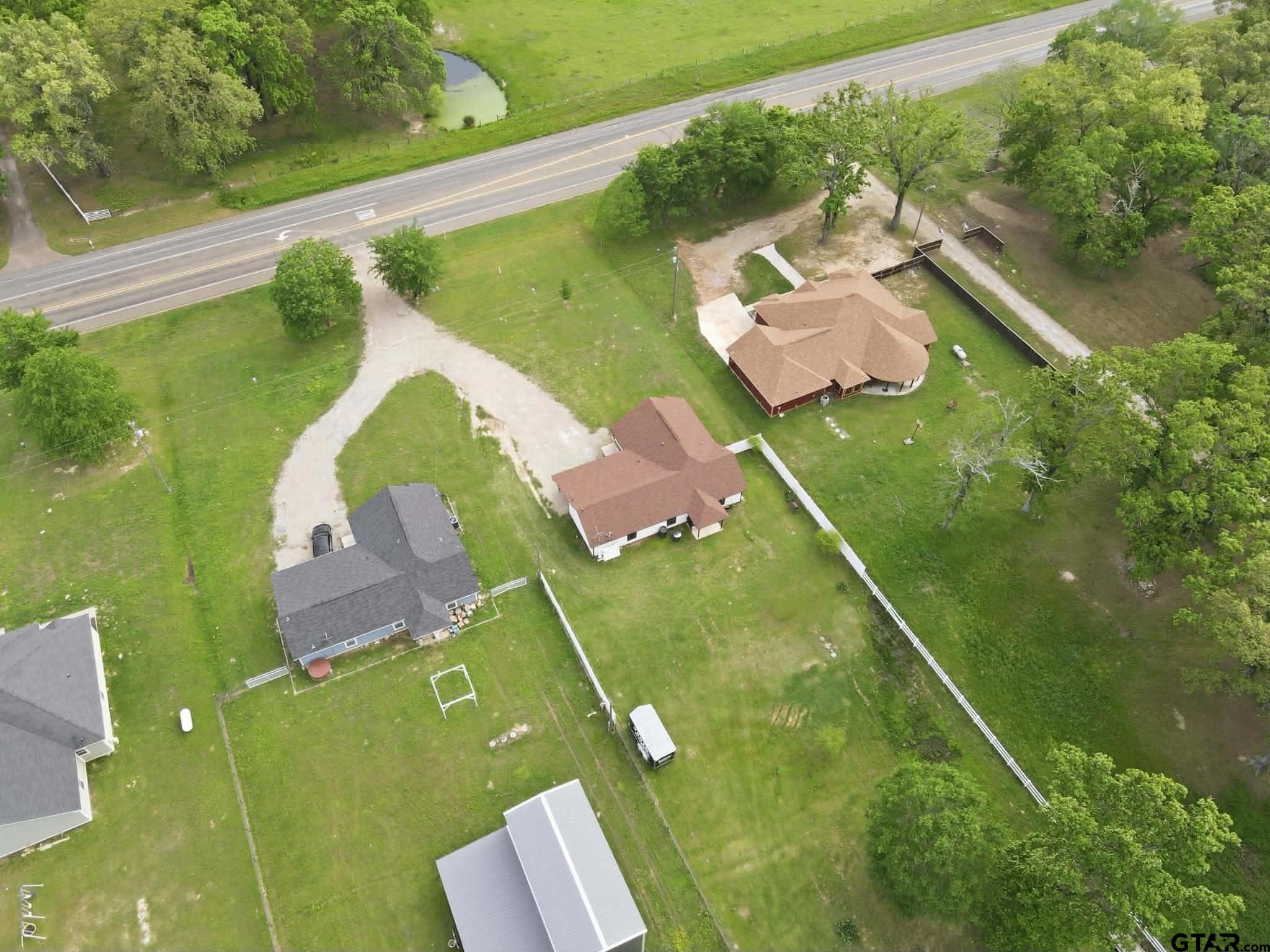 1933 Highway 11 Pittsburg, TX 75686 - Photo 28 of 34 an aerial view of a house with a garden