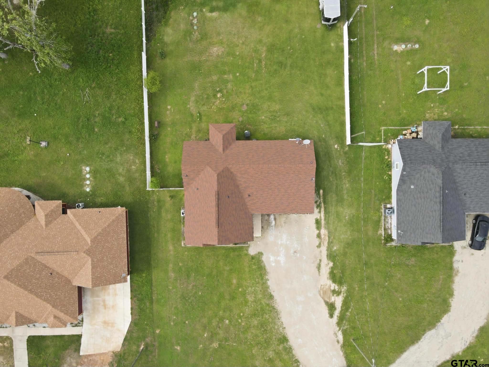1933 Highway 11 Pittsburg, TX 75686 - Photo 30 of 34 an aerial view of a house with a yard basket ball court and outdoor seating