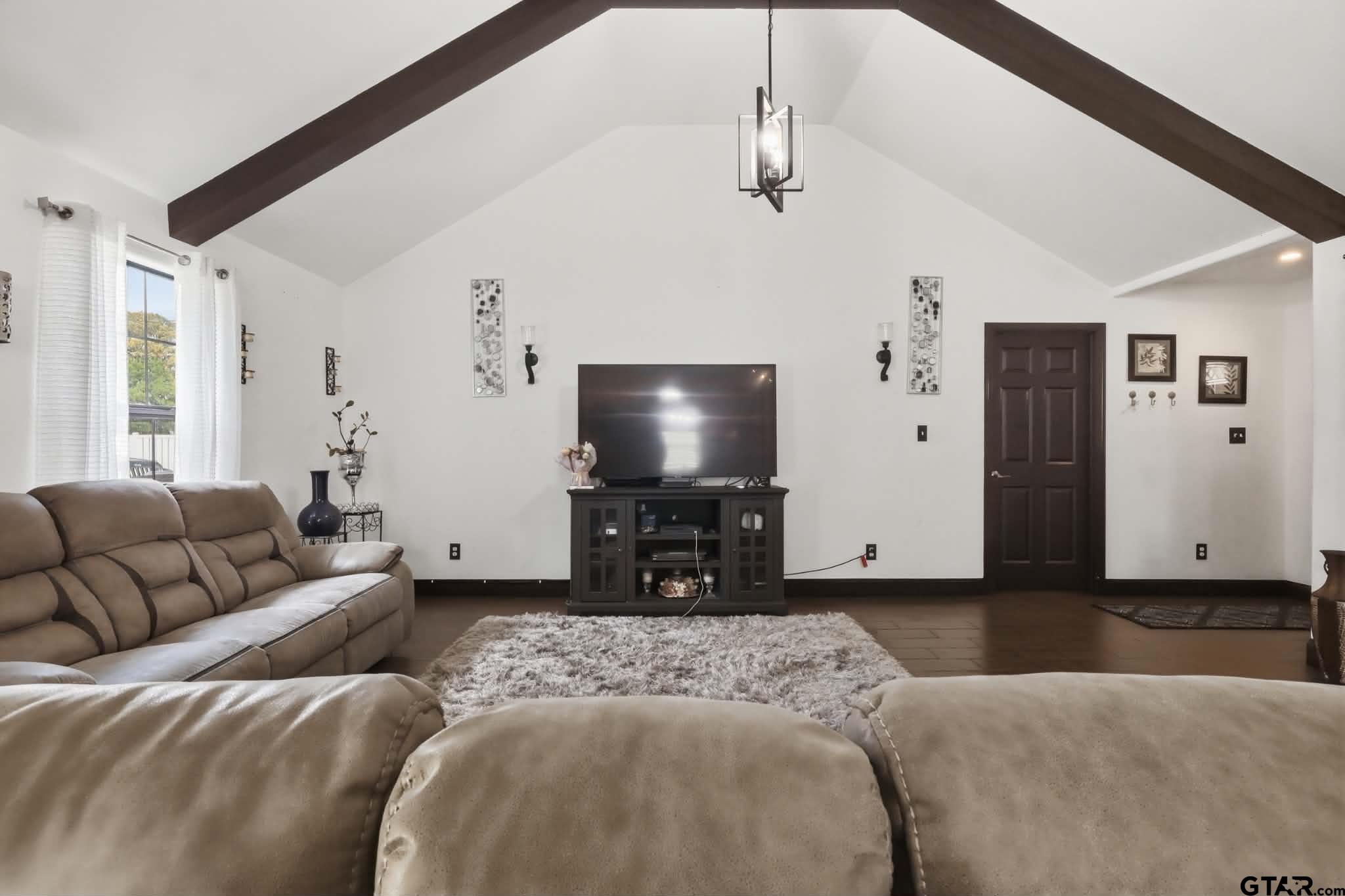 1933 Highway 11 Pittsburg, TX 75686 - Photo 3 of 34 a living room with furniture and a flat screen tv