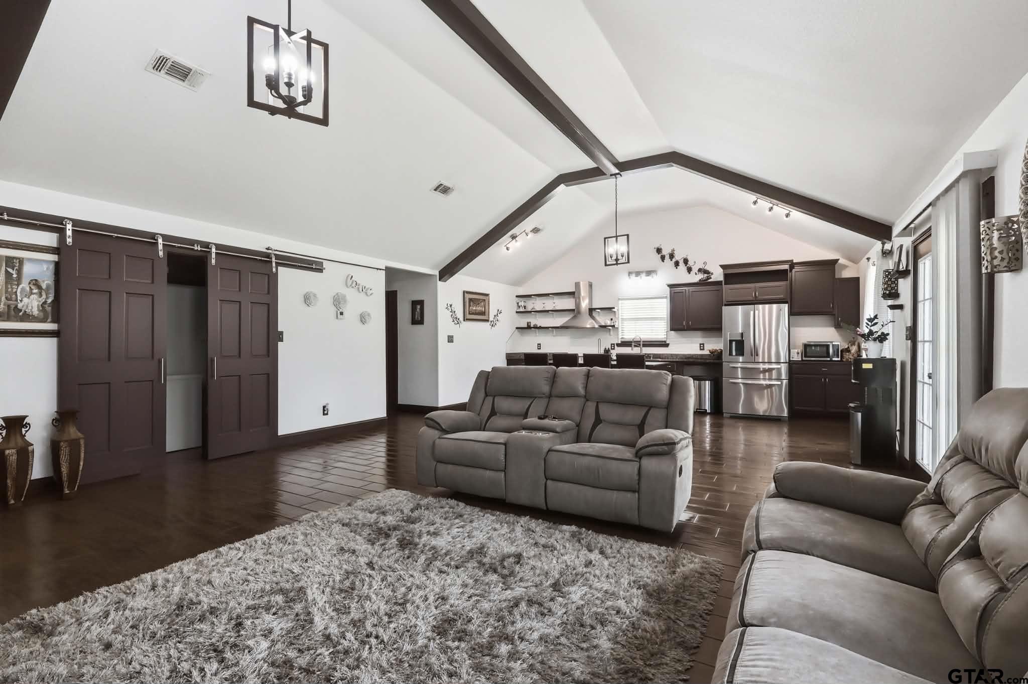 1933 Highway 11 Pittsburg, TX 75686 - Photo 6 of 34 a living room with furniture and a ceiling fan