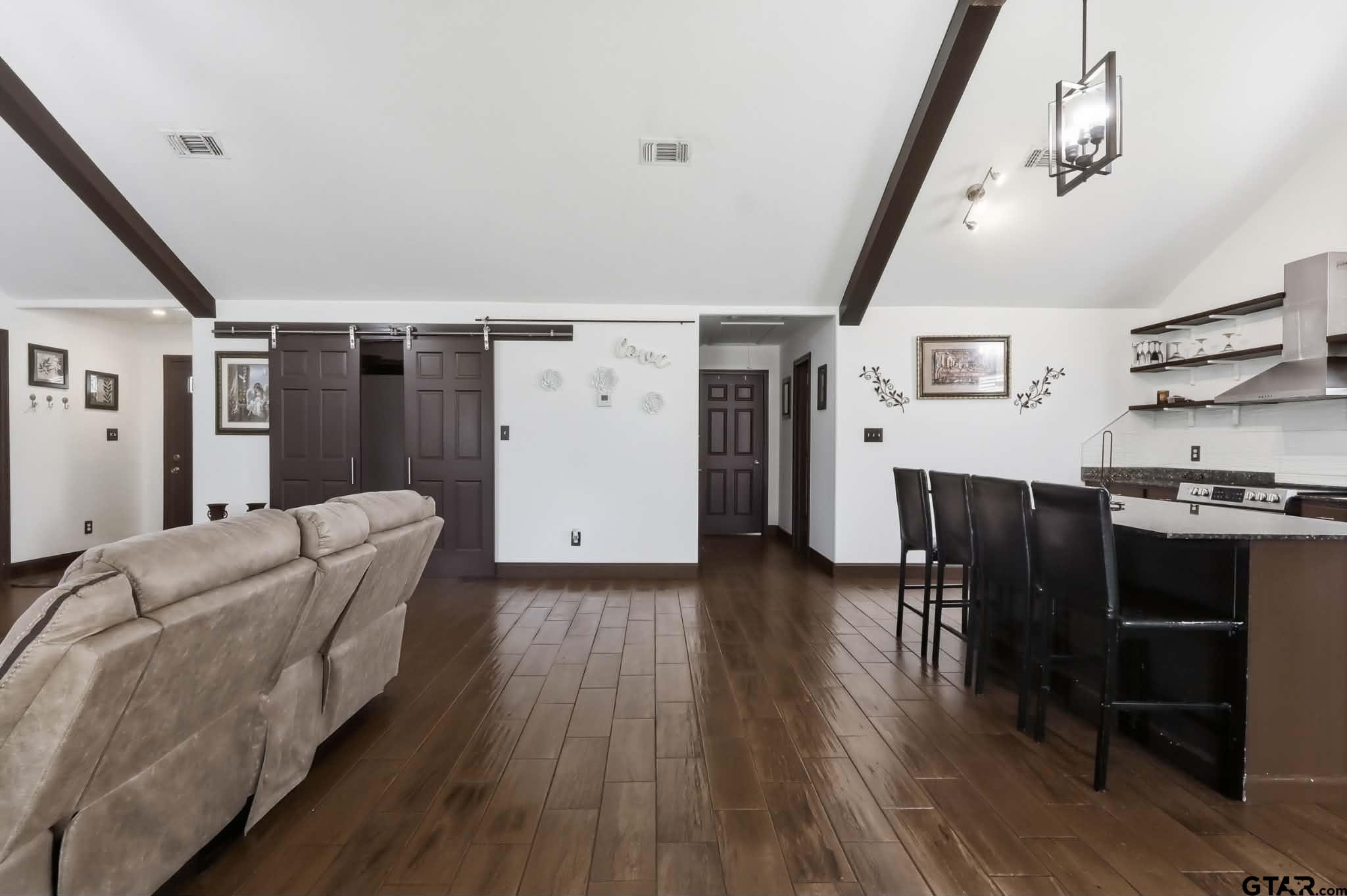 1933 Highway 11 Pittsburg, TX 75686 - Photo 7 of 34 a living room with furniture and a wooden floor
