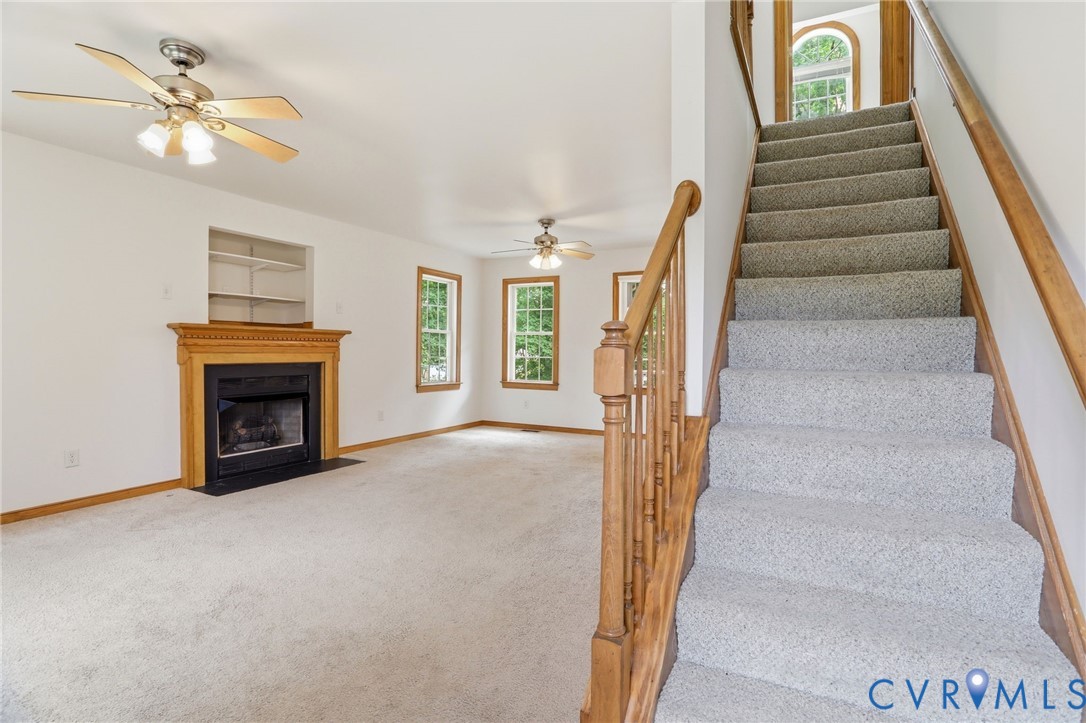 14420 Branding Iron Road Chesterfield, VA 23838 - Photo 19 of 50 Carpeted staircase with wooden banister, featuring