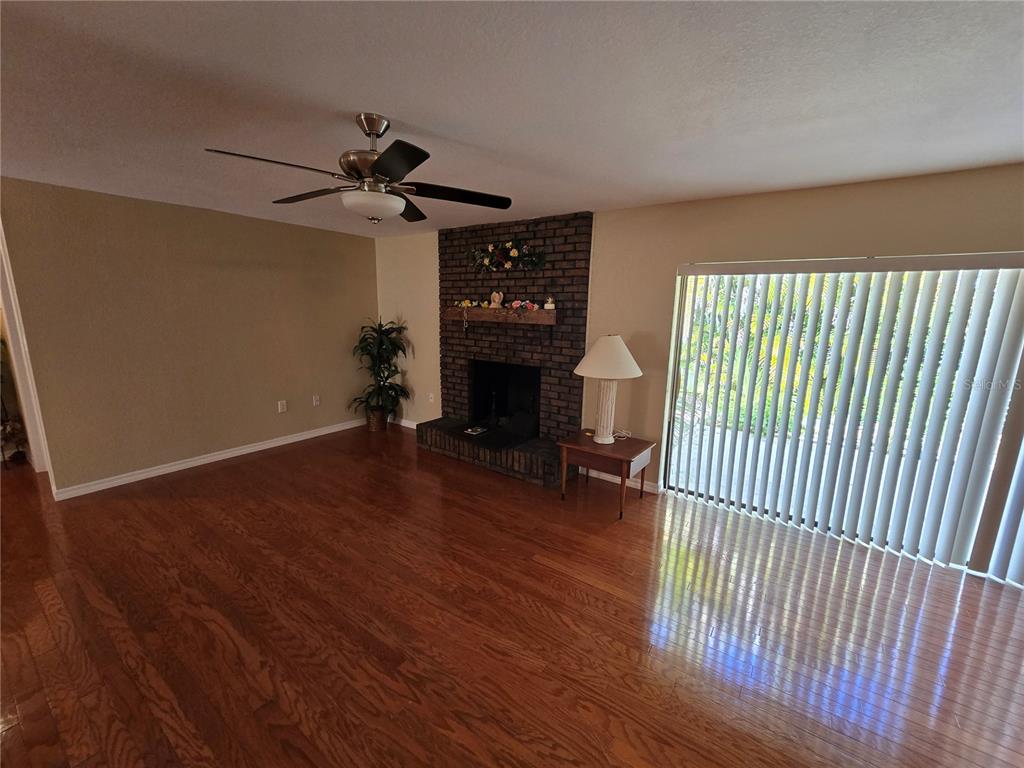 22200 Oneida Avenue Port Charlotte, FL 33952 - Photo 9 of 26 a view of livingroom with furniture and wooden floor