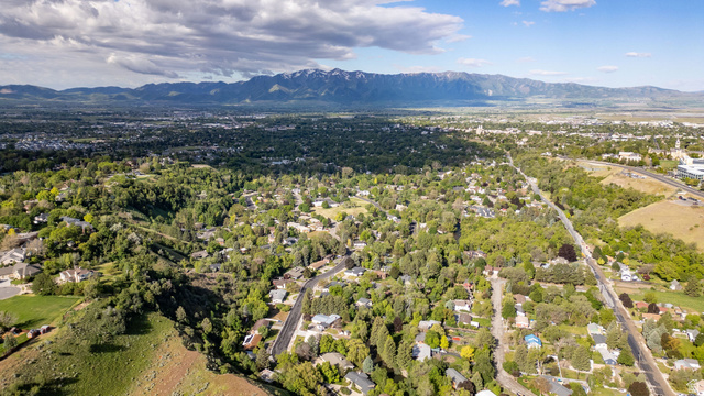 1365 Sumac Drive Logan, UT 84321 - Photo 56 of 66 Expansive aerial perspective showcasing a residential landscape set against a mountain range backdrop