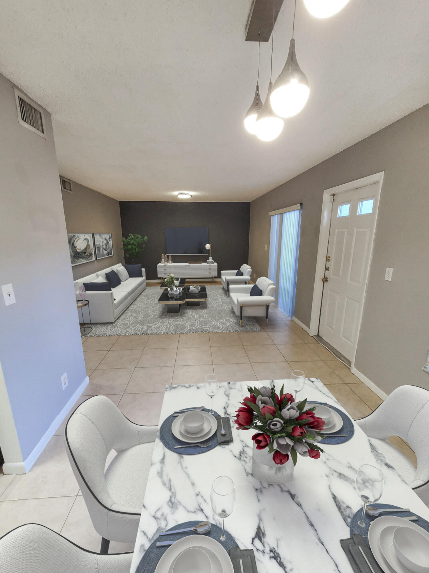 2445 Southwest 22nd Avenue, Unit 1020 Delray Beach, FL 33445 - Photo 15 of 37 a living room with furniture and flowers