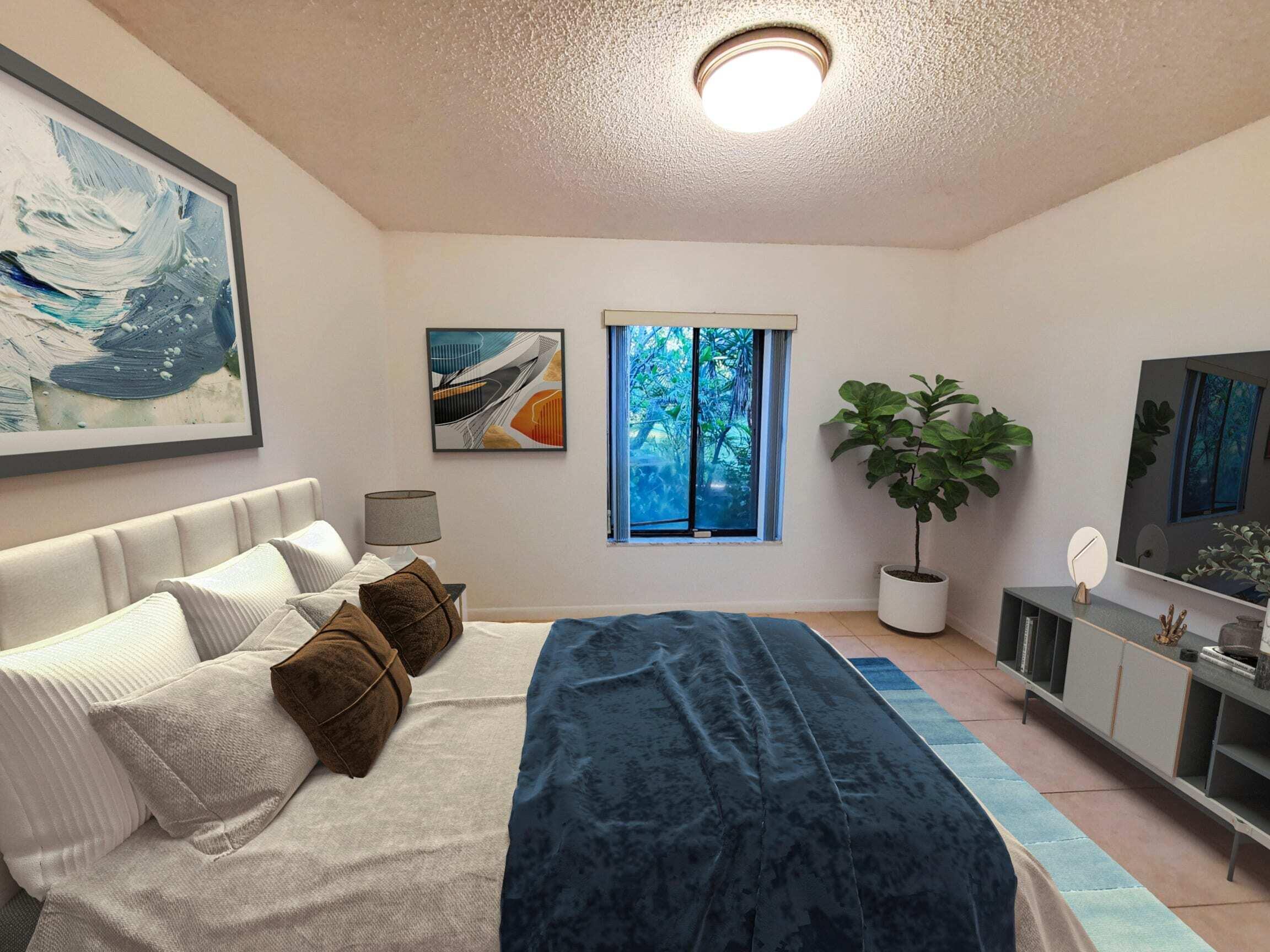 2445 Southwest 22nd Avenue, Unit 1020 Delray Beach, FL 33445 - Photo 24 of 37 a bedroom with furniture and a chandelier