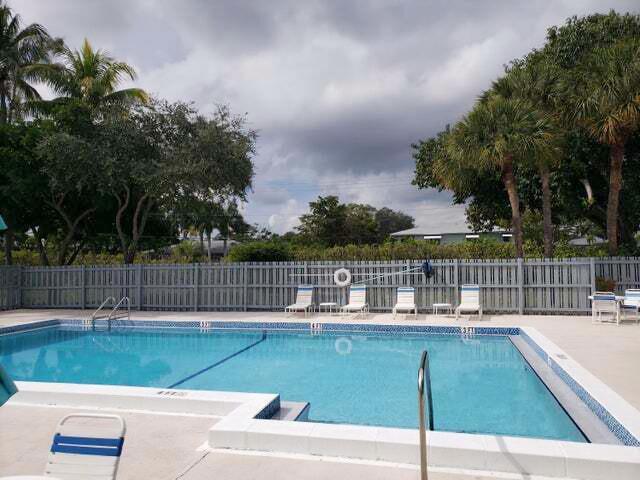 2445 Southwest 22nd Avenue, Unit 1020 Delray Beach, FL 33445 - Photo 37 of 37 a view of swimming pool