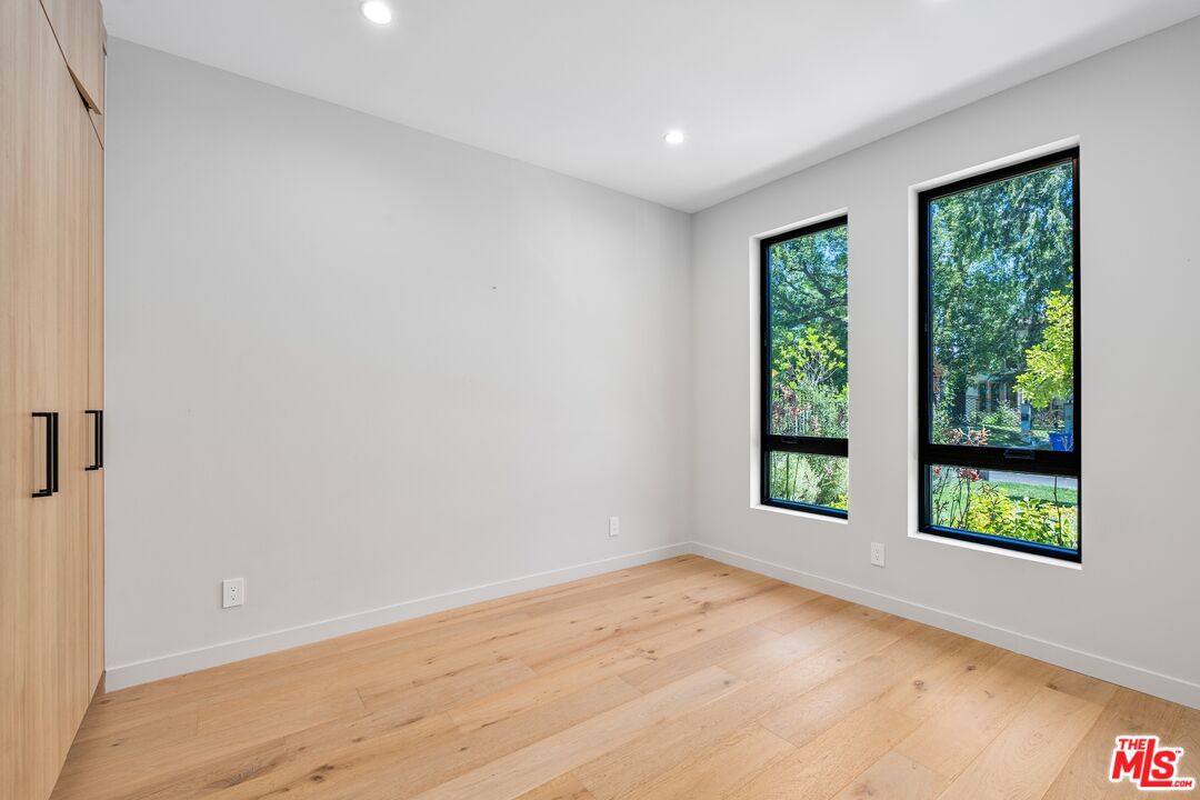 4647 Morse Avenue Sherman Oaks, CA 91423 - Photo 2 of 47 an empty room with windows