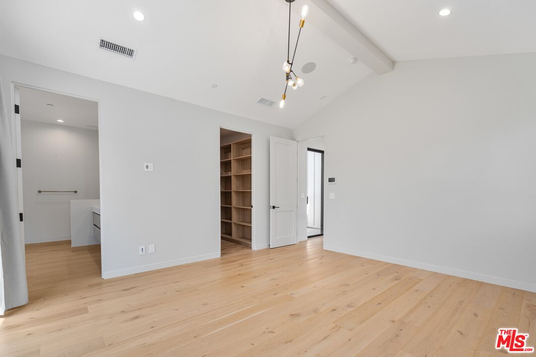 4647 Morse Avenue Sherman Oaks, CA 91423 - Photo 35 of 47 an empty room with closet and windows