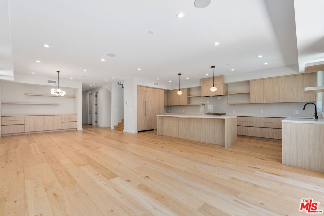 4647 Morse Avenue Sherman Oaks, CA 91423 - Photo 9 of 47 a view of kitchen with wooden cabinet and stainless steel appliances