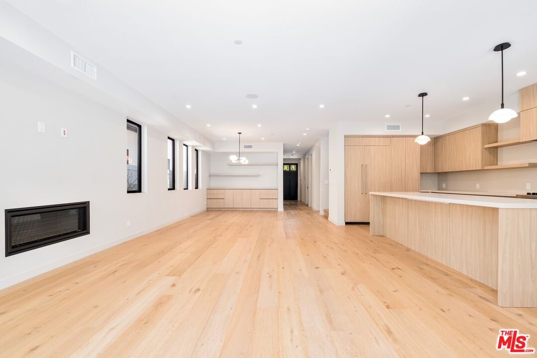 4647 Morse Avenue Sherman Oaks, CA 91423 - Photo 10 of 47 a view of a kitchen with a sink and a refrigerator