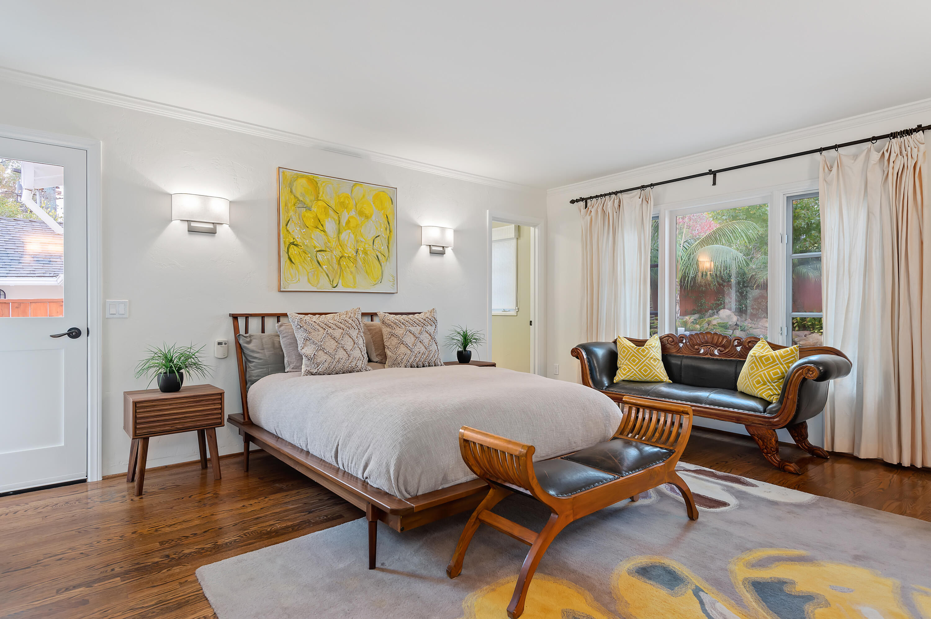 189 Hermosillo Road Montecito, CA 93108 - Photo 20 of 47 a bedroom with a bed and a couch