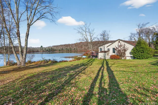 a view of a dining room with furniture window and flowerpot