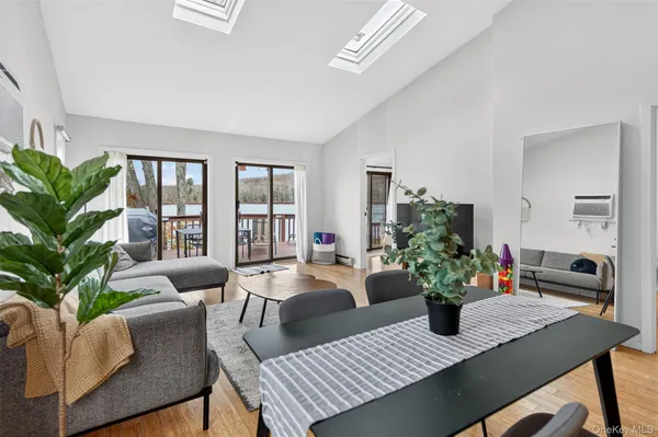 a view of a dining room with furniture window and flowerpot