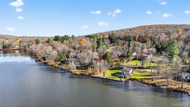 a view of a chairs on the roof deck