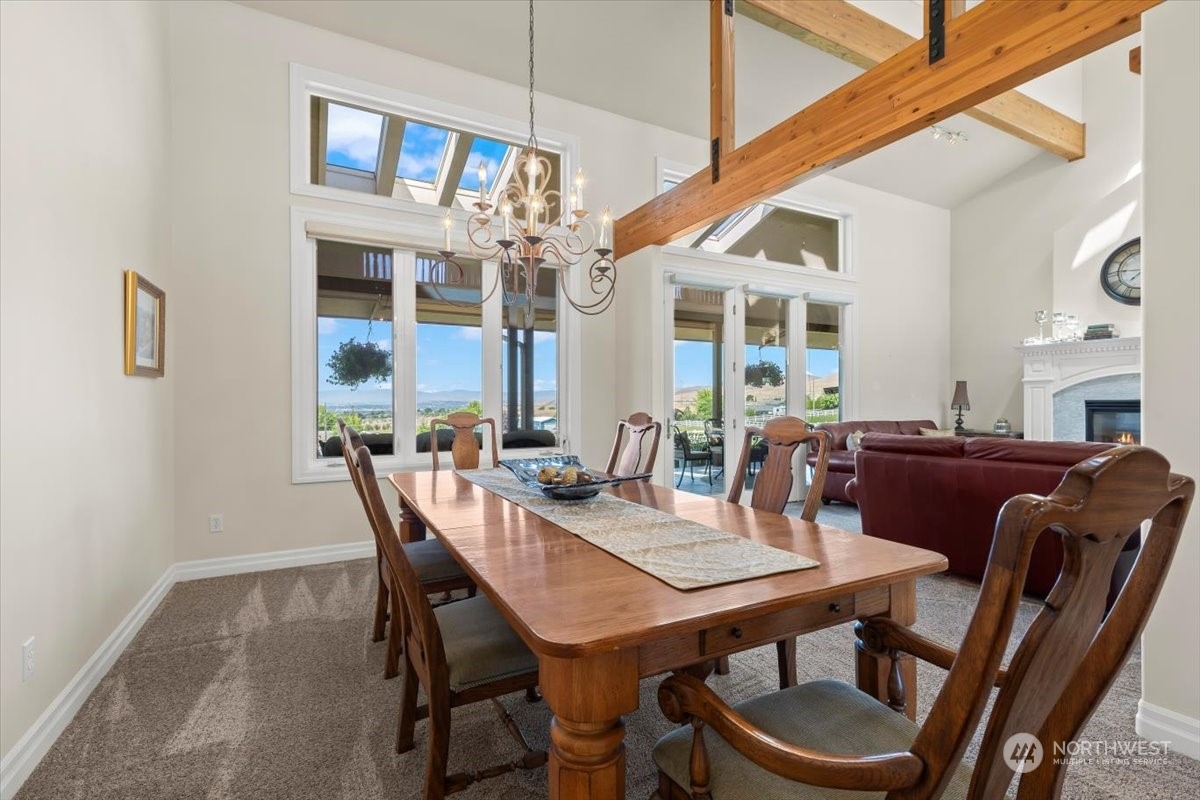 201 Wendt Road Yakima, WA 98901 - Photo 4 of 32 a view of a dining room with furniture window and wooden floor