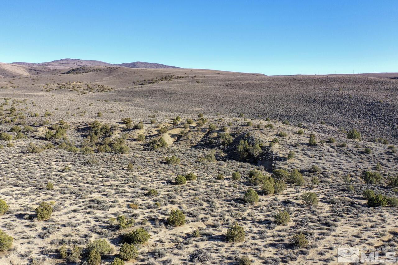 0 Rio Seco Lane Sparks, NV 89441 - Photo 14 of 14 a view of a dry field with mountains in the background