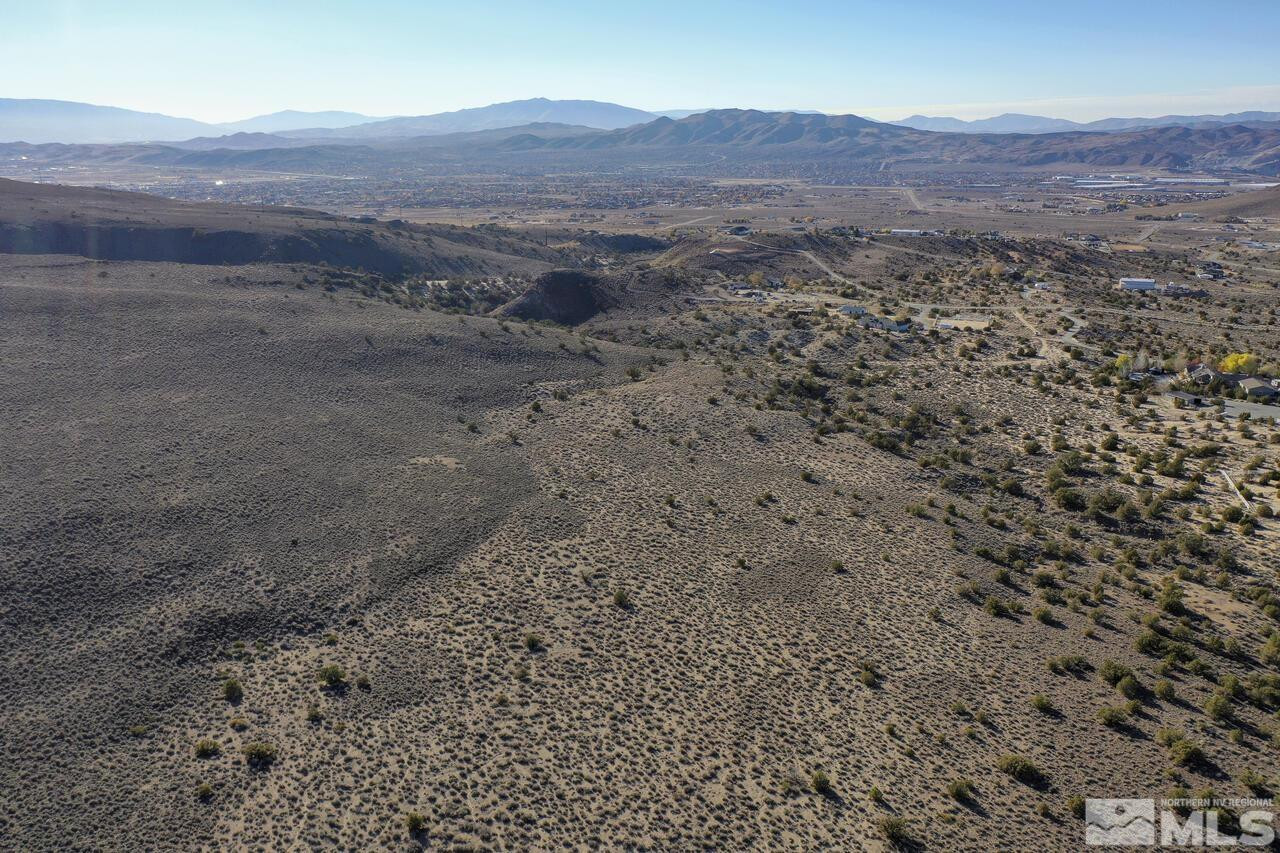 0 Rio Seco Lane Sparks, NV 89441 - Photo 5 of 14 a view of a dry field with mountains in the background