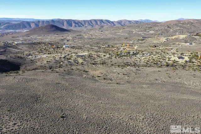 an aerial view of mountain with beach