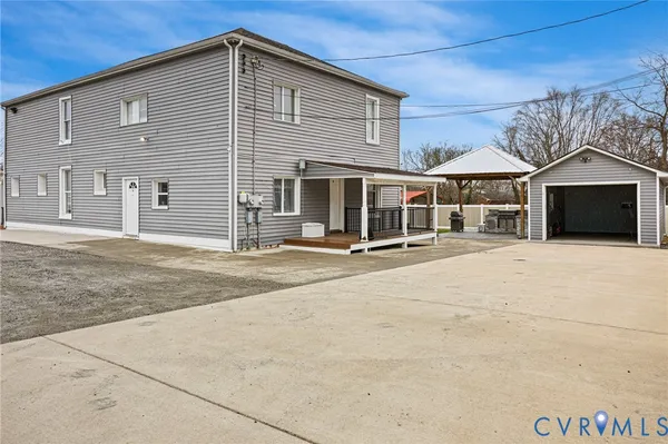 a view of a house with large windows