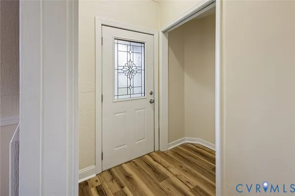 a view of a livingroom with wooden floor