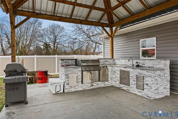 a view of a backyard of the house