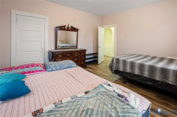 a picture of a bench in front of a window