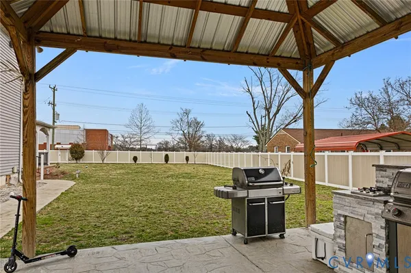 a view of a balcony with wooden floor