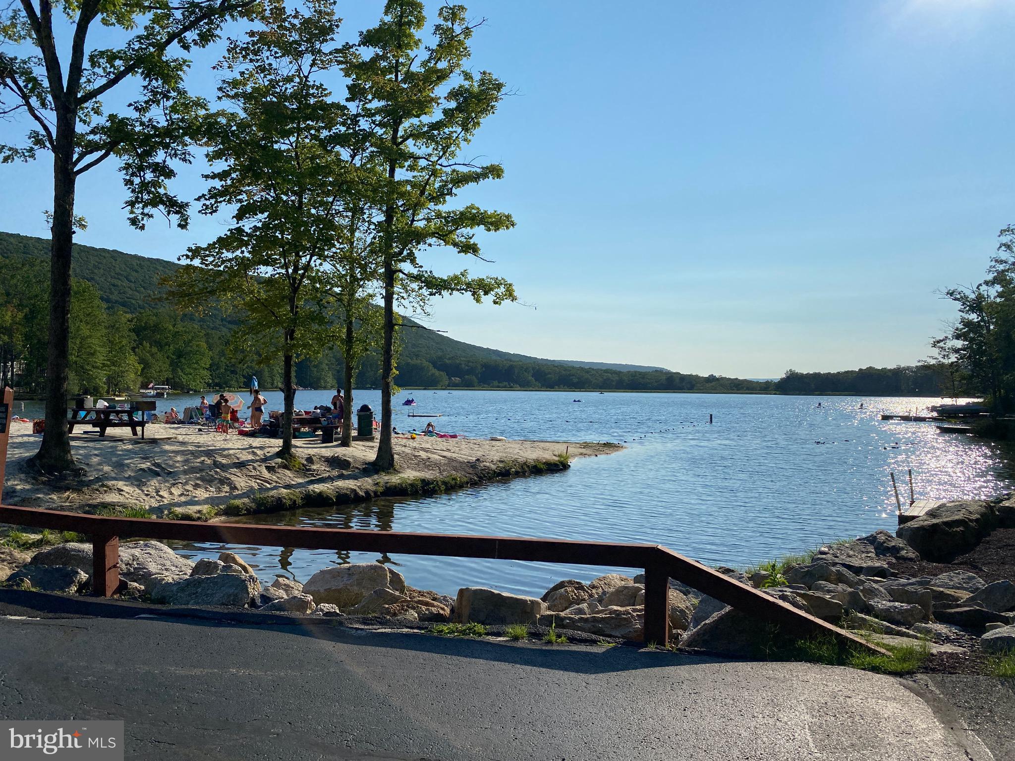 395 Horseshoe Hazleton, PA 18202 - Photo 7 of 24 a view of a lake with houses