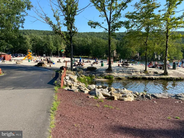 a view of a park with benches