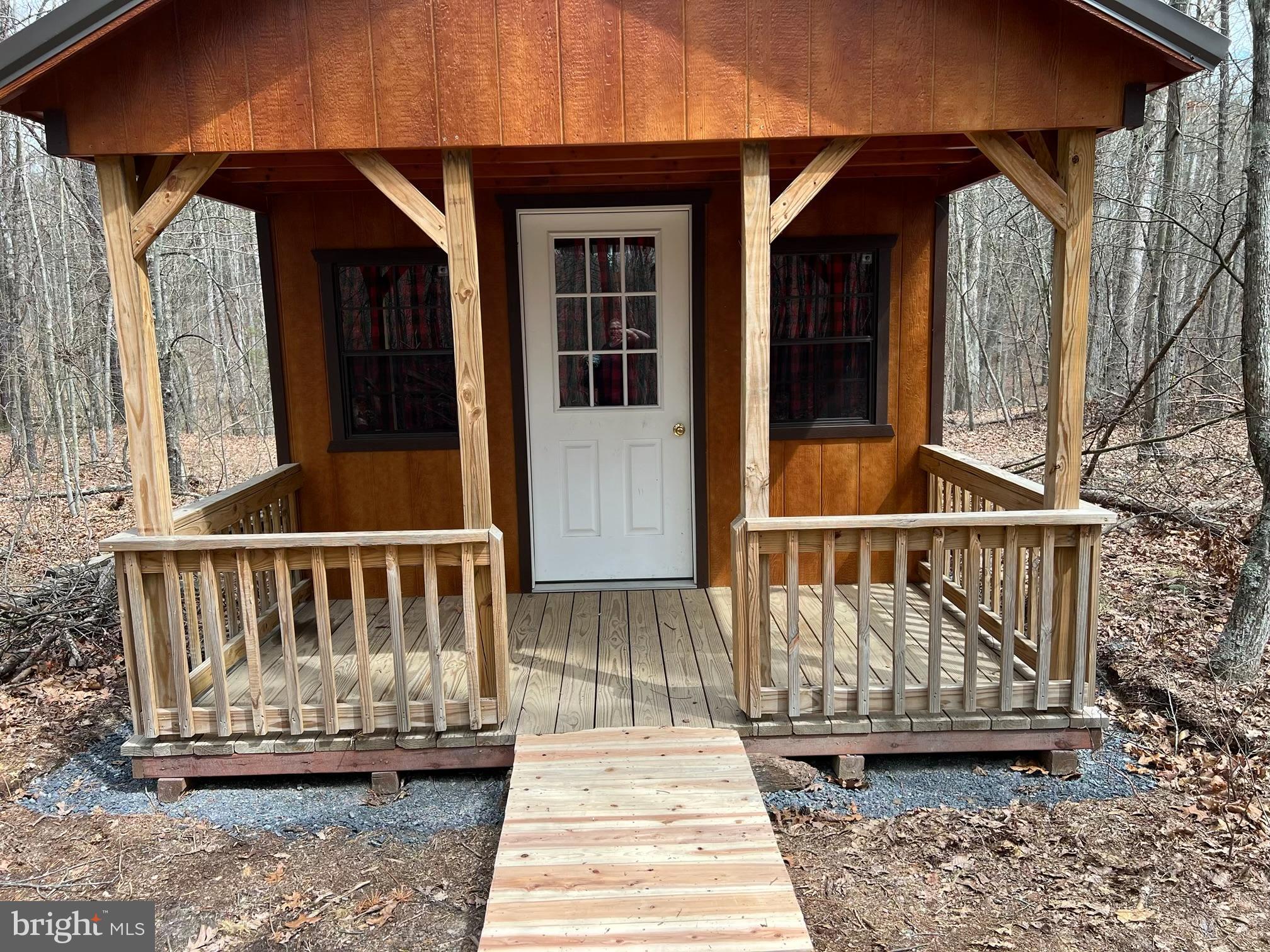 Loudan Lane Berkeley Springs, WV 25411 - Photo 1 of 13 a view of a wooden deck with a yard
