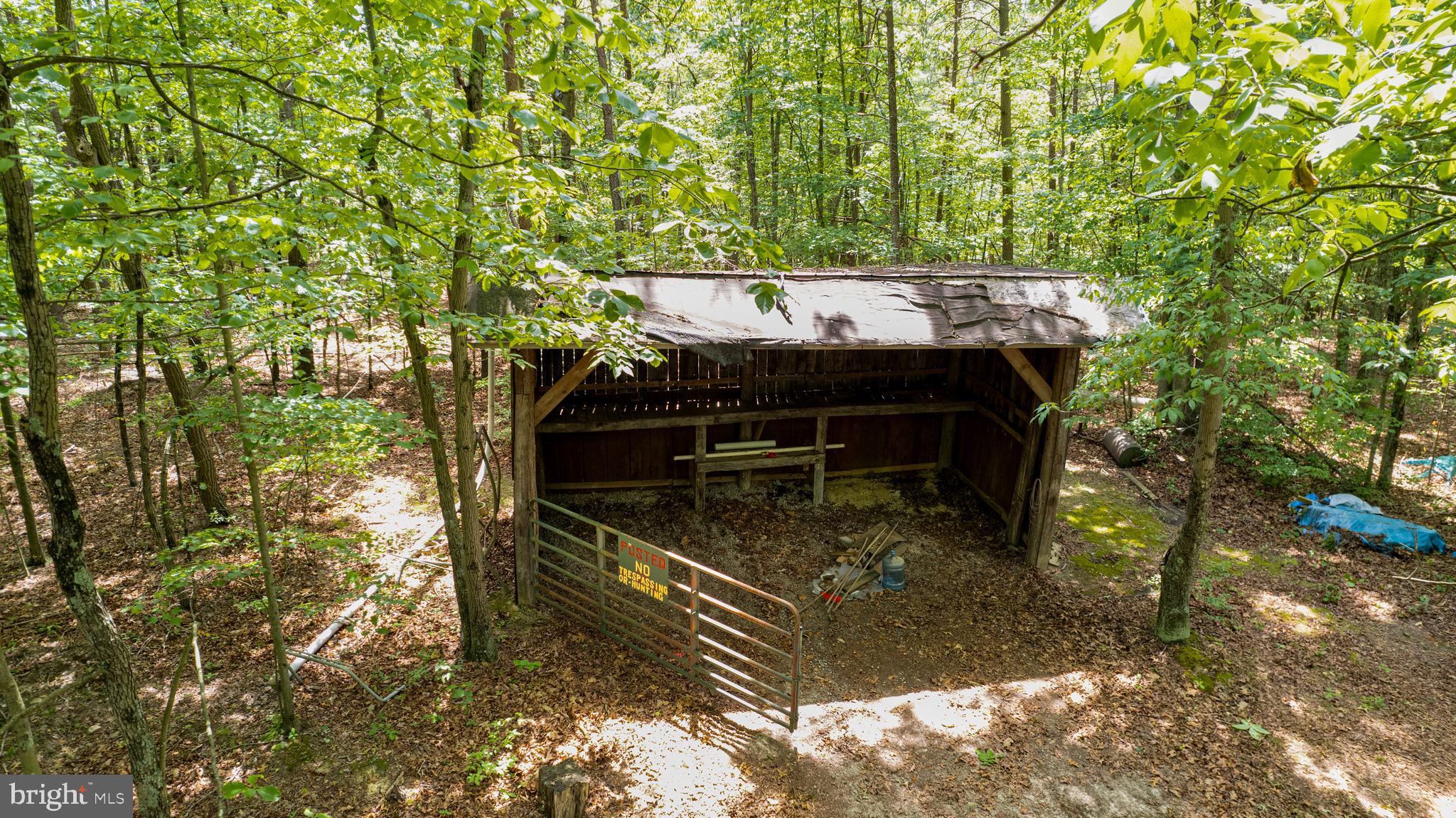 Loudan Lane Berkeley Springs, WV 25411 - Photo 6 of 13 a view of a yard with chairs