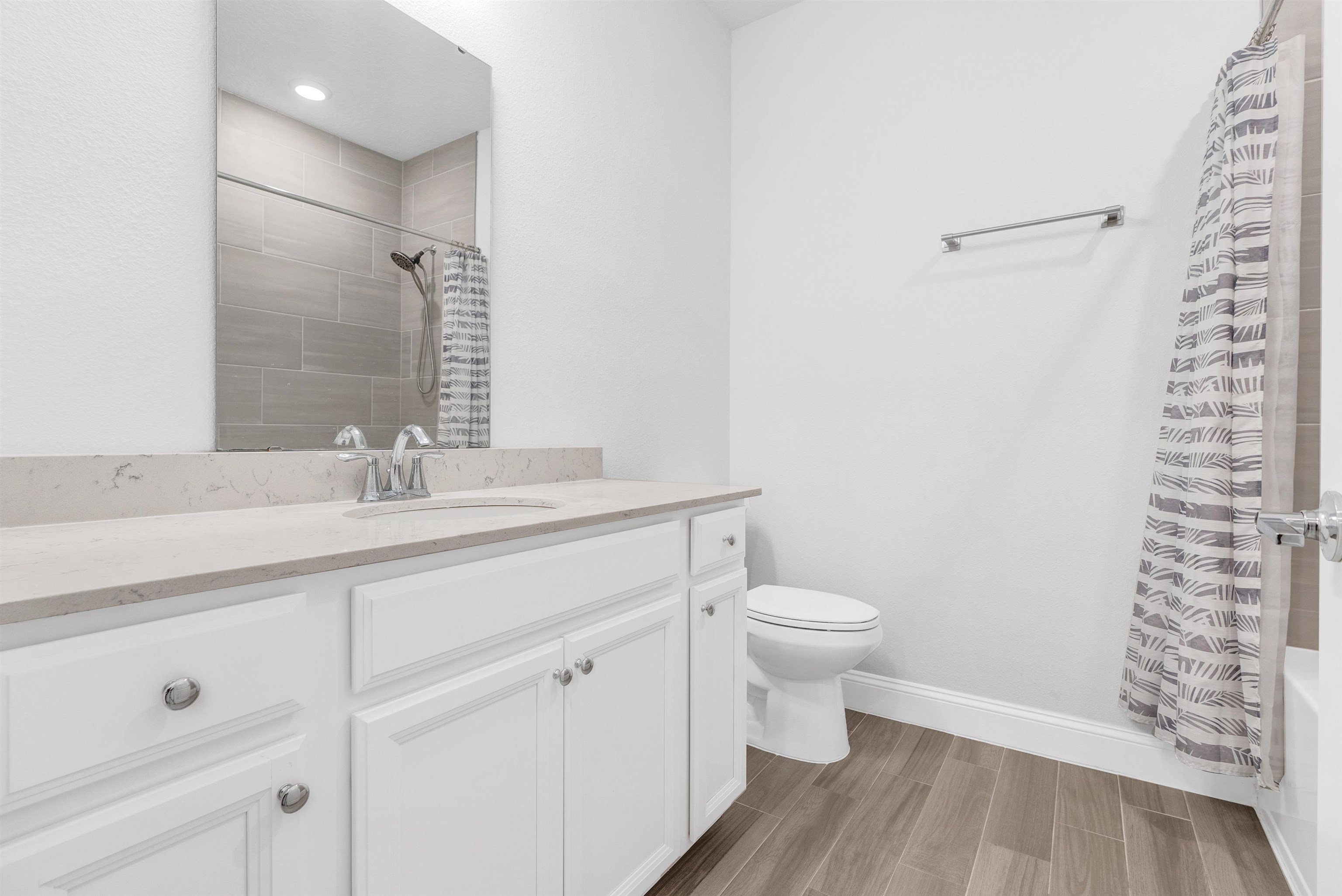 75 Pine Candle Way St. Augustine, FL 32092 - Photo 24 of 84 a bathroom with a sink a toilet a shower and a mirror