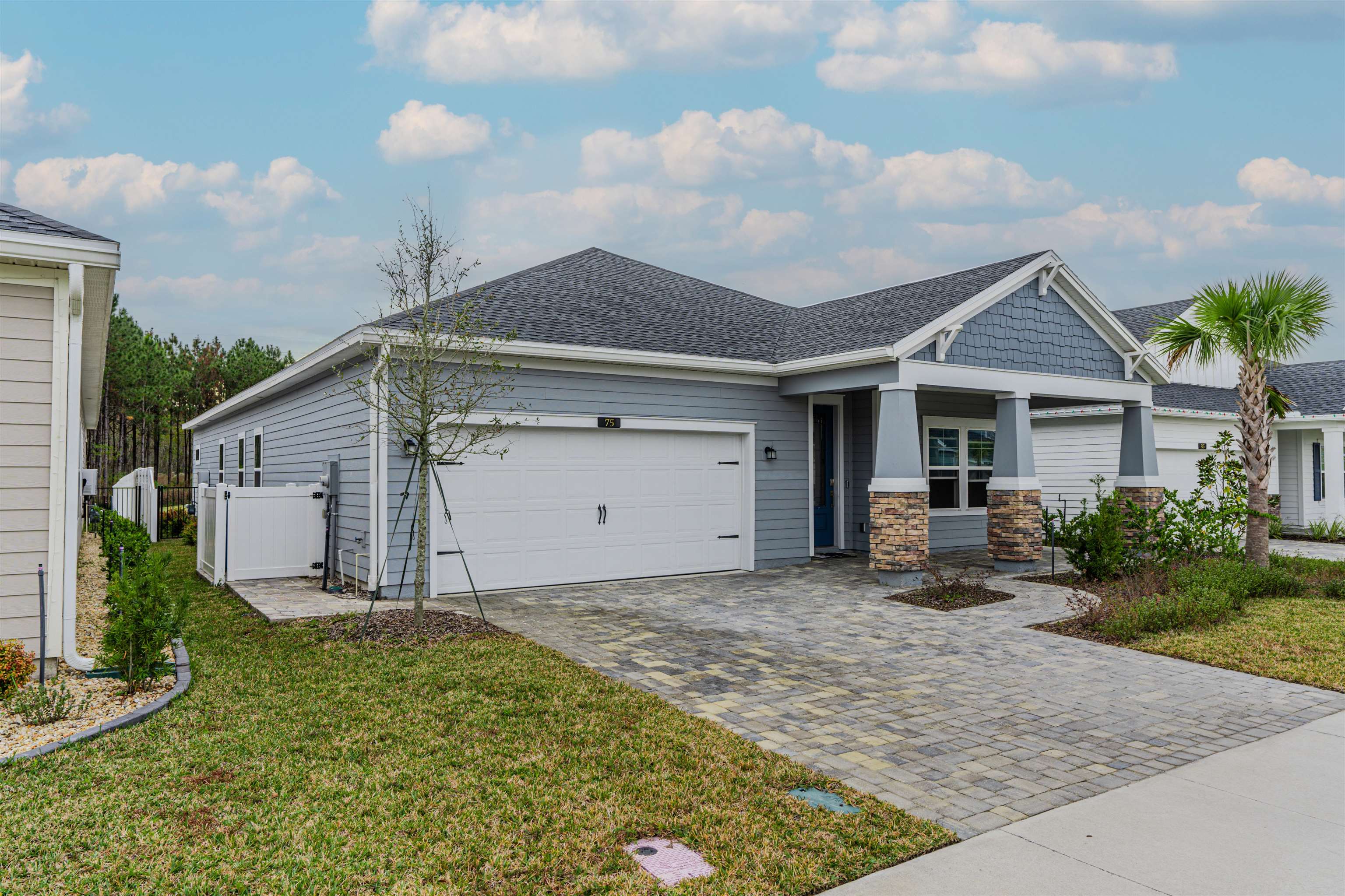 75 Pine Candle Way St. Augustine, FL 32092 - Photo 38 of 84 a view of a house with backyard and garden