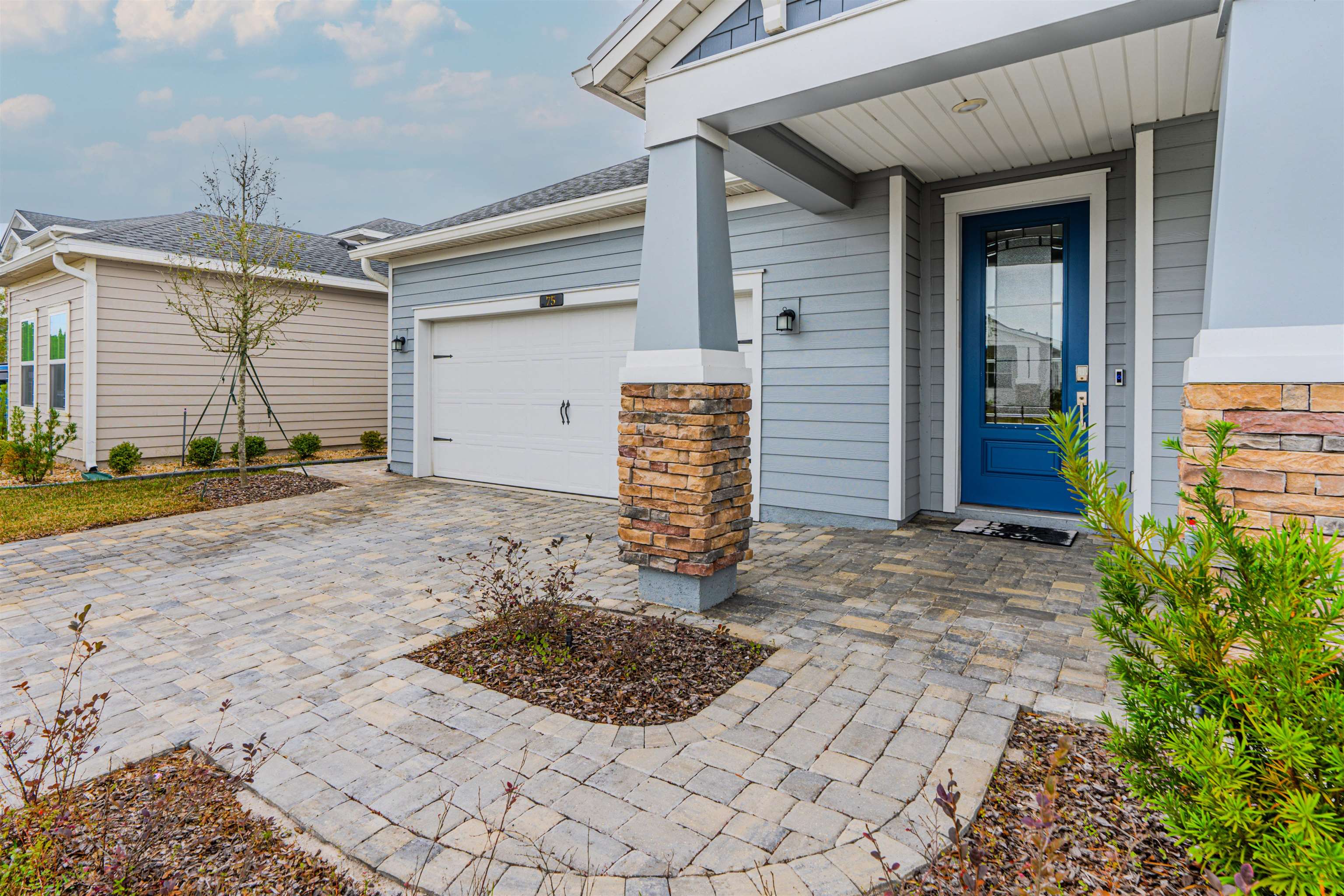 75 Pine Candle Way St. Augustine, FL 32092 - Photo 40 of 84 a view of a entryway door front of house