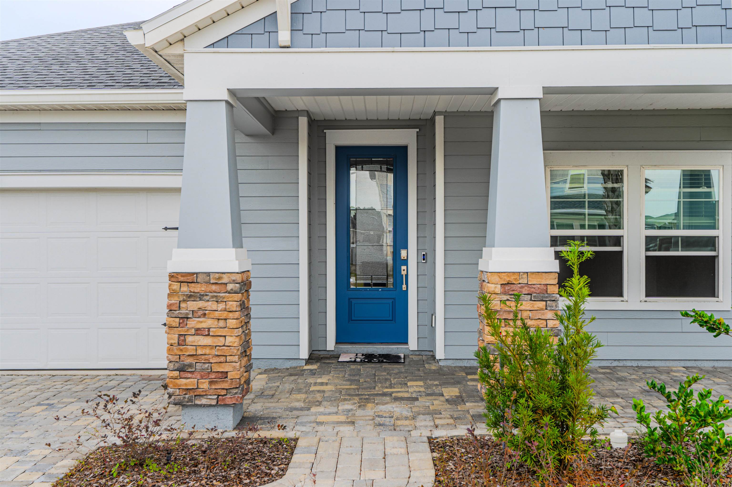 75 Pine Candle Way St. Augustine, FL 32092 - Photo 42 of 84 a front view of a house with a yard