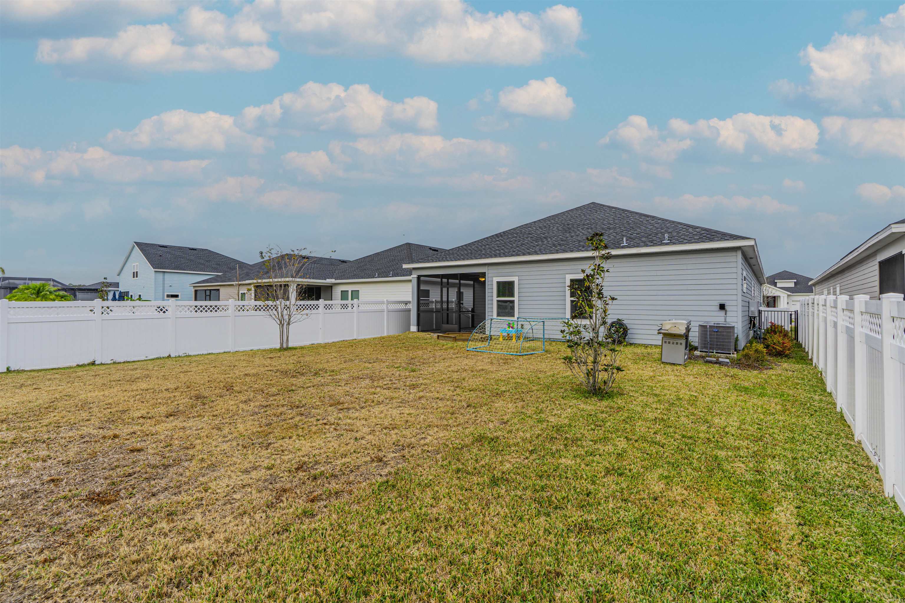 75 Pine Candle Way St. Augustine, FL 32092 - Photo 46 of 84 a front view of house with yard and entertaining space