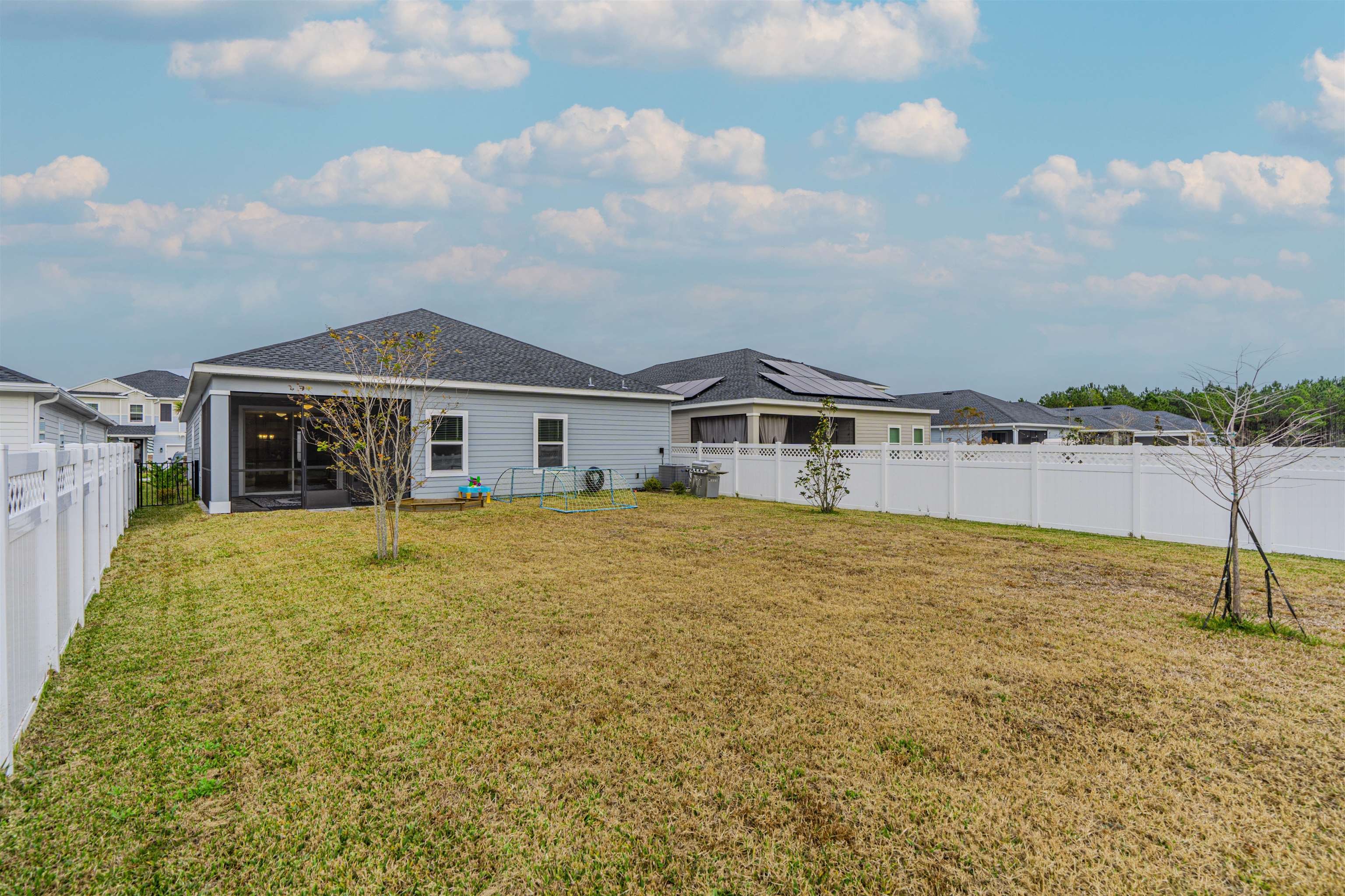 75 Pine Candle Way St. Augustine, FL 32092 - Photo 47 of 84 a front view of a house with a yard