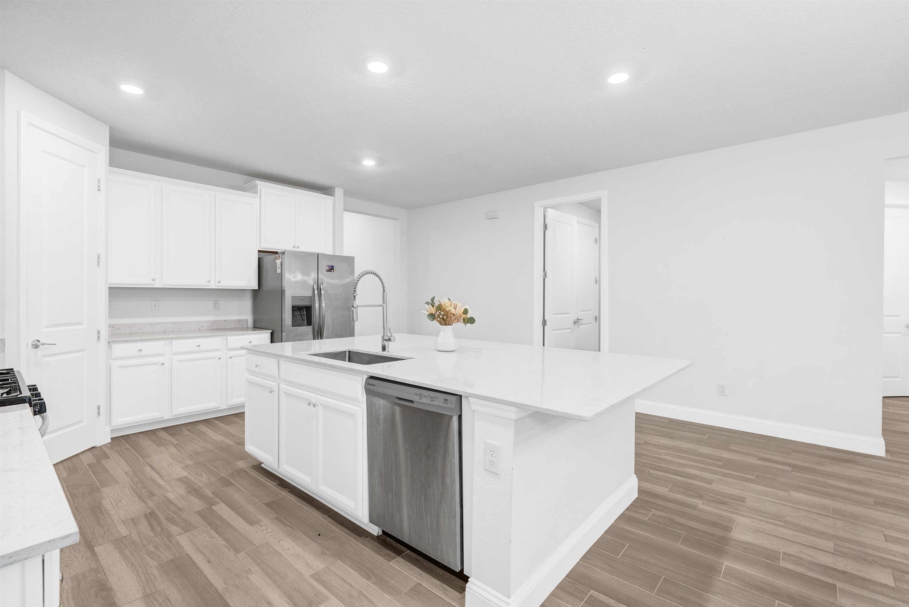 75 Pine Candle Way St. Augustine, FL 32092 - Photo 5 of 84 a kitchen with a sink stainless steel appliances and cabinets