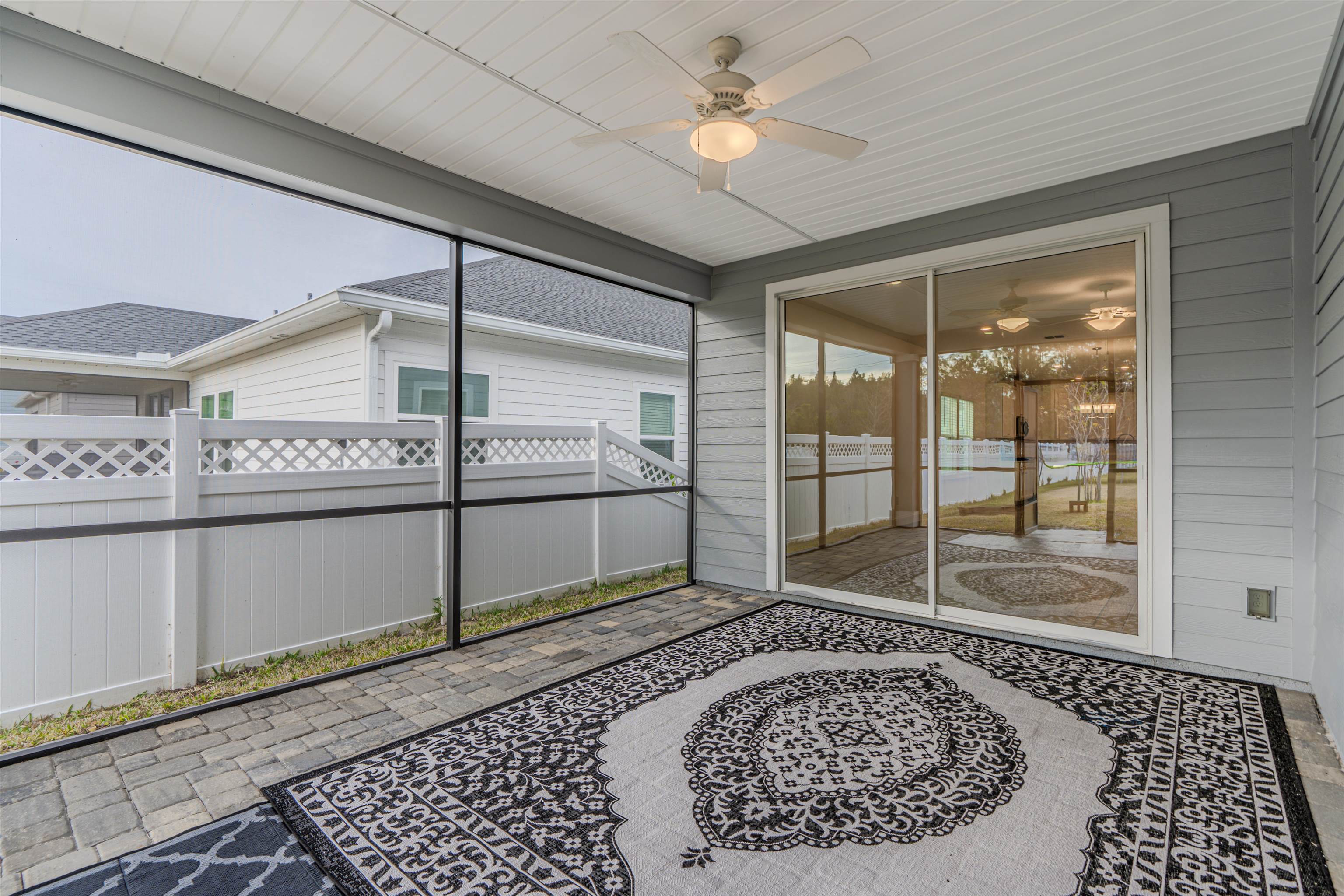 75 Pine Candle Way St. Augustine, FL 32092 - Photo 51 of 84 a view of a hallway with a glass door shower and yard