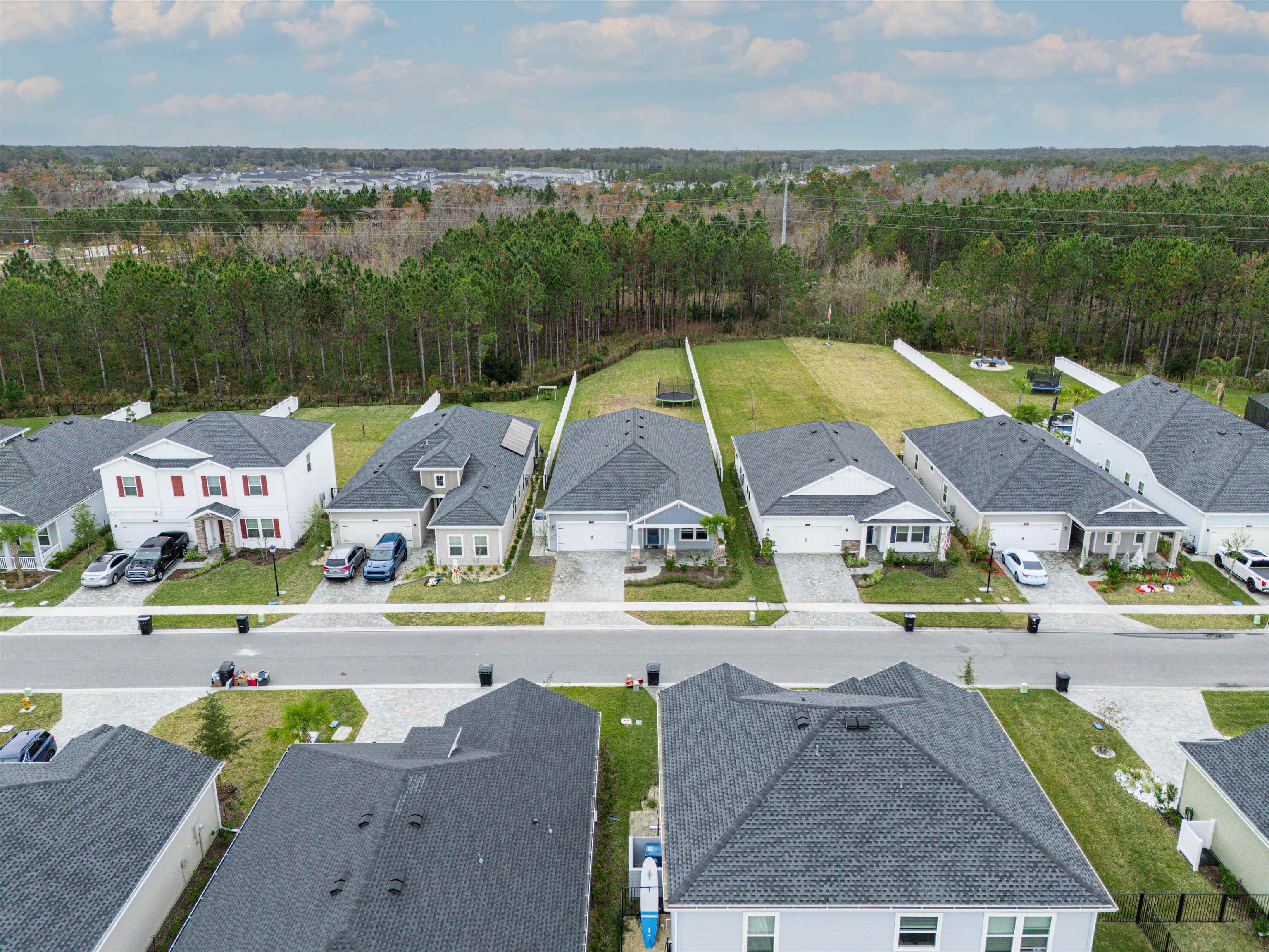75 Pine Candle Way St. Augustine, FL 32092 - Photo 52 of 84 an aerial view of residential houses with outdoor space and swimming pool