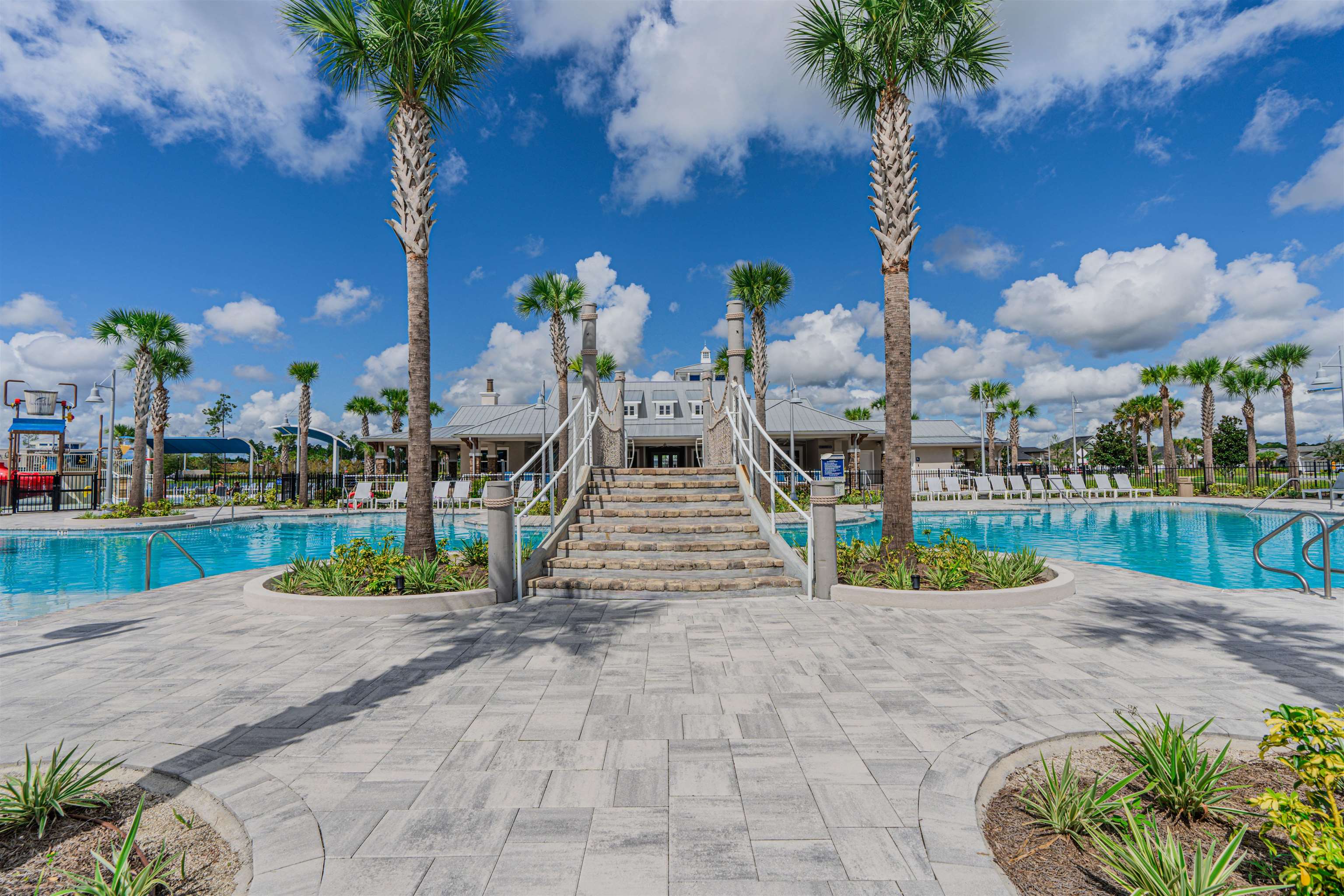 75 Pine Candle Way St. Augustine, FL 32092 - Photo 68 of 84 a front view of a house with garden and trees