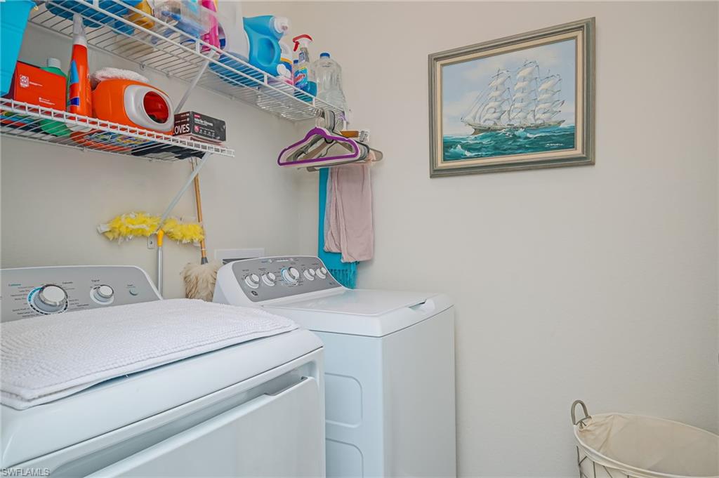 1803 Alameda Drive Naples, FL 34120 - Photo 17 of 30 a utility room with dryer and washer