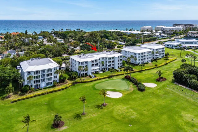 a view of a golf course with a park
