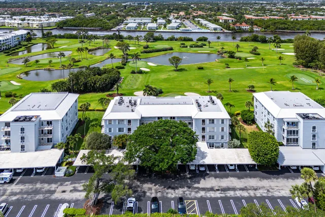 a view of a swimming pool with a yard