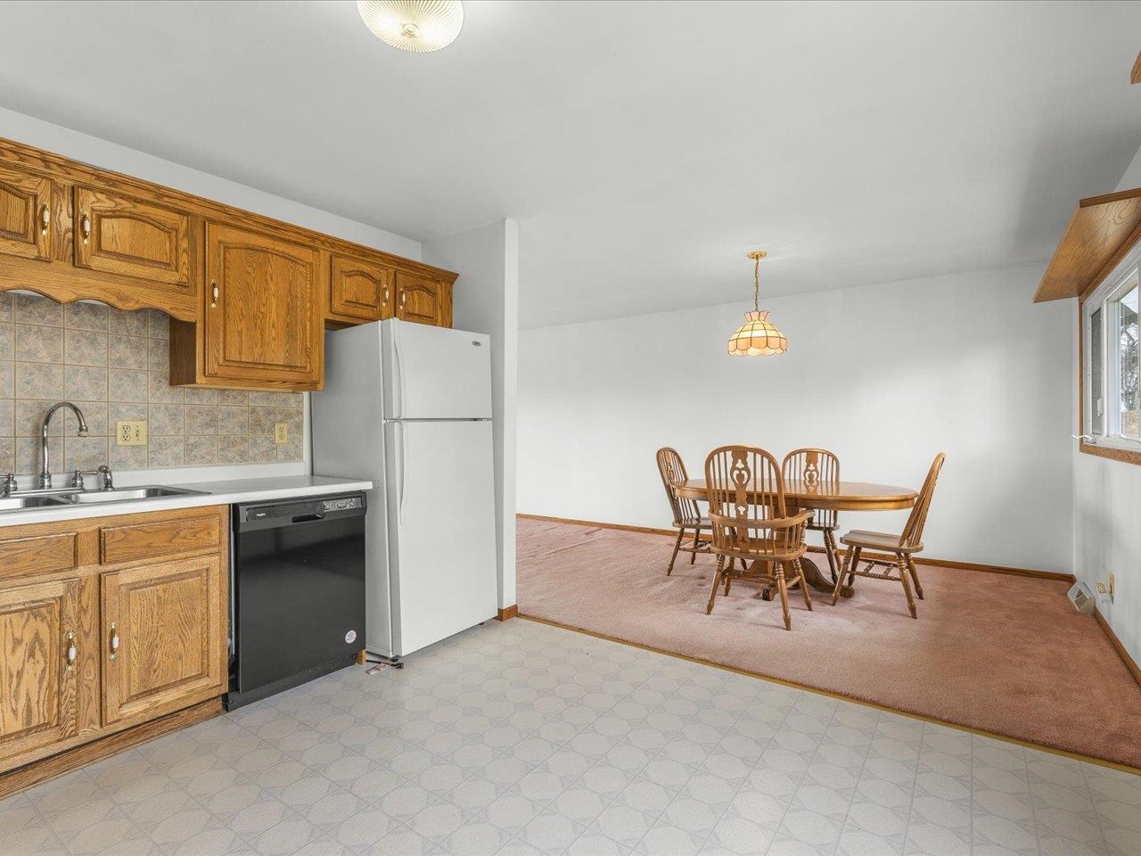 2110 East Angle Road Dakota, IL 61018 - Photo 13 of 47 a dining room with furniture and window