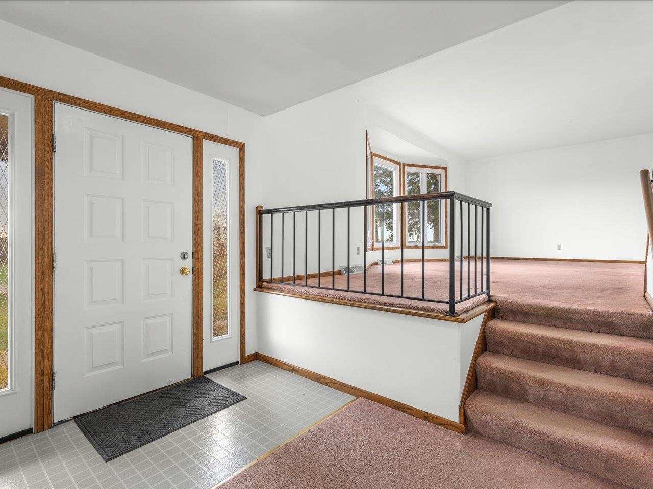 2110 East Angle Road Dakota, IL 61018 - Photo 15 of 47 a view of a hallway with staircase
