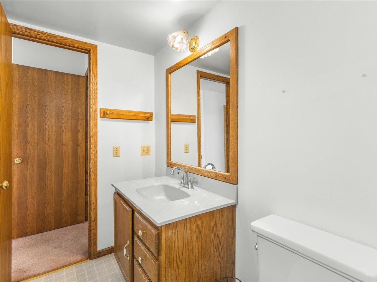 2110 East Angle Road Dakota, IL 61018 - Photo 18 of 47 a bathroom with a sink a toilet and shower