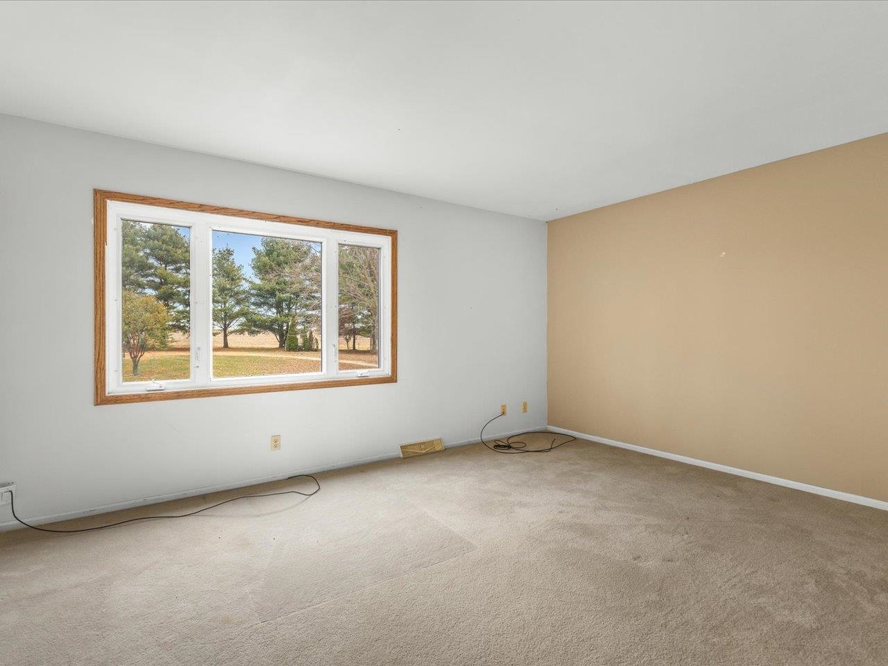2110 East Angle Road Dakota, IL 61018 - Photo 24 of 47 an empty room with windows