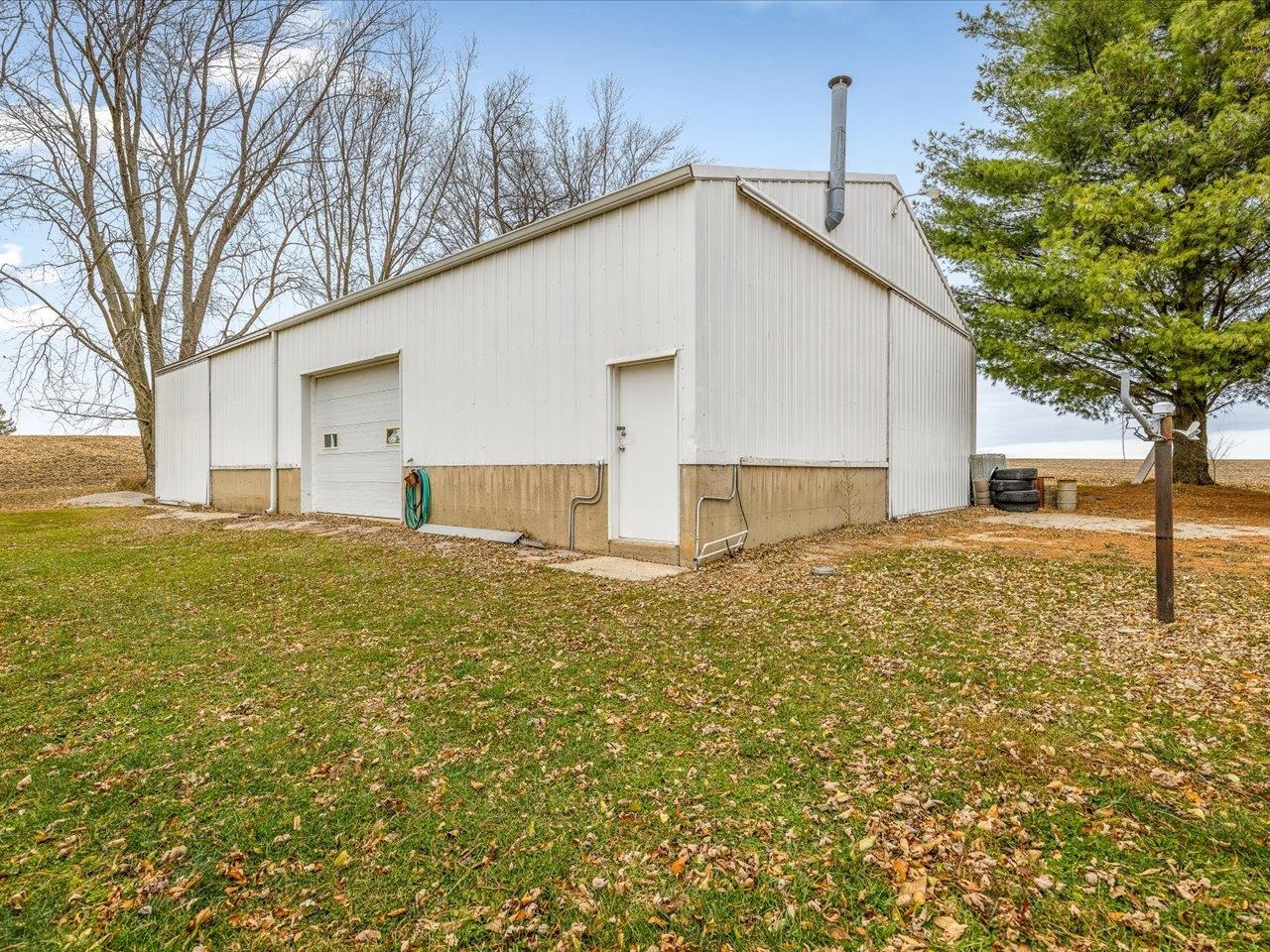 2110 East Angle Road Dakota, IL 61018 - Photo 35 of 47 a house view with a outdoor space
